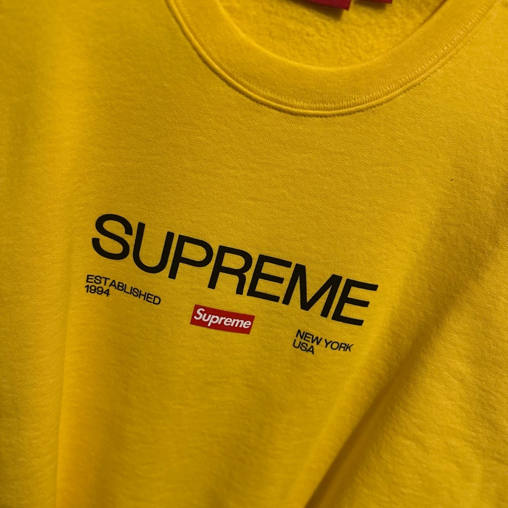 Supreme Yellow sweatshirt with Black and Red Accents